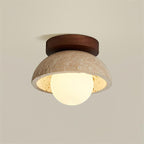 Plafonnier compact aspect pierre – globe opale et embase bois