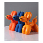 Statue chien ballon en résine – finition mate, nœud doré