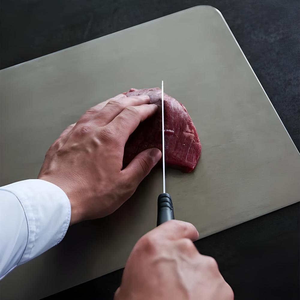 Planche à découper en inox – surface non poreuse et poignée intégrée
