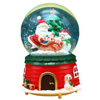 Boule à neige musicale Père Noël – Flocons et mélodie festive
