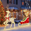 Renne lumineux de Noël – décoration musicale avec traîneau