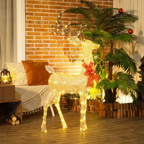 Renne lumineux – décoration extérieur pailletée, nœud rouge