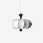 Suspension sculptée en bois et tissu – design minimaliste