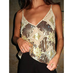 Top semi-transparent – motif floral avec paillettes et col en V